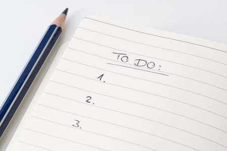 close-up view of to do list on page of notepadの写真素材
