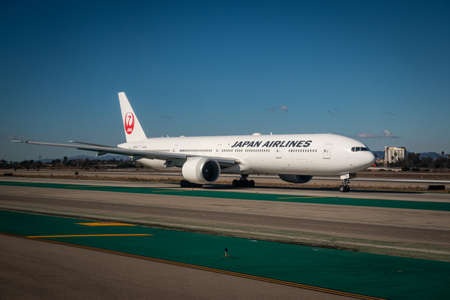 LOS ANGELES, CA, U.S.A. - Dec. 29, 2020: Photo of a Japan Airlines jet arriving on the tarmac at LAX...
