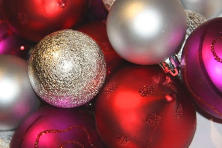 Various decorative spheres in red, purple and silver
