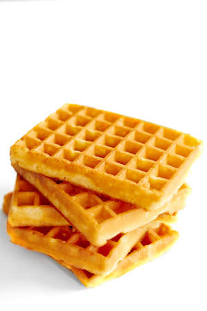 Belgian waffles on white wooden tableの写真素材