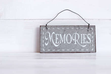 Memories word written on metal plate
