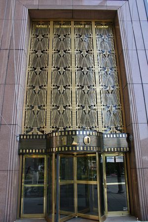 The entrance to a building on Wall Street in New York Cityの写真素材