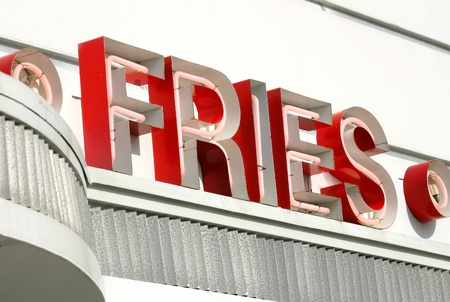 An old fashioned sign that reads Friesの写真素材