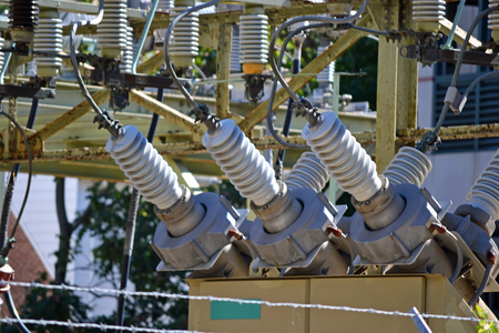 A view of a high voltage substation with switches and insulators