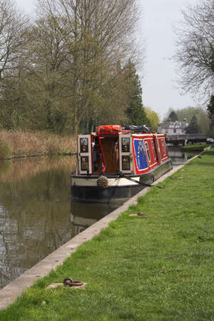hand painted canal narrow-boat on riverの写真素材