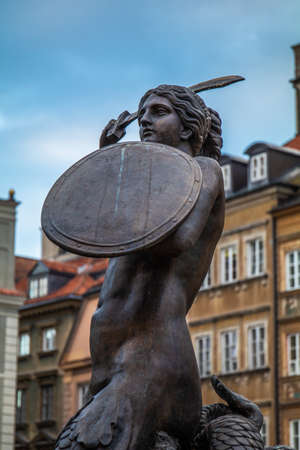 Bronze statue of a woman warrior in Warsaw in Polandの写真素材