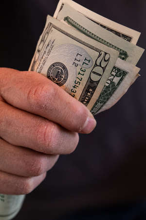 fist full of US dollar bills