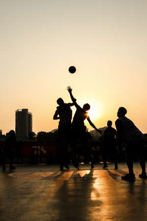 playing basketball under Sunset