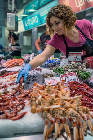 Woman seling seafoodのeditorial素材