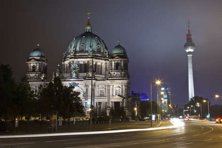 The Berliner Dom and the TV Tower at Night in Berlin.  St. Mary's church and the Park Inn hotel can also be seen in the distance.の写真素材