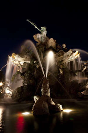 A night view of the Neptune Fountain in Berlin - Germany.の写真素材