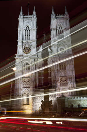 Light trails passing Westminster Abbeyの写真素材