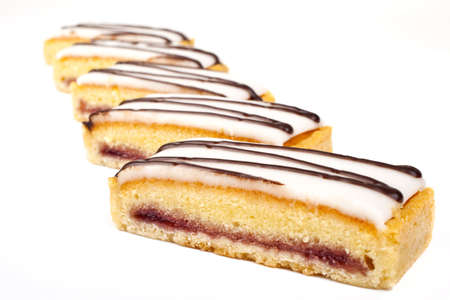 Cherry Bakewell Slices over a white background.の写真素材