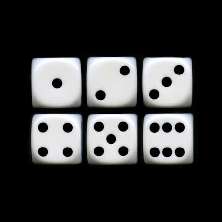 The six sides of a Dice on a black background の写真素材