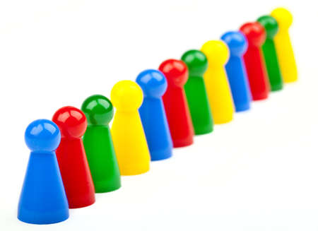 Blue, red, green and yellow Game Pieces Fligures の写真素材