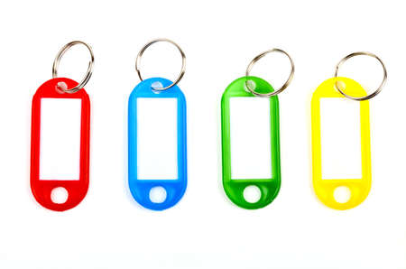 Coloured Key Tags over a white background.の写真素材