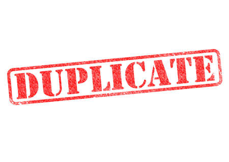 DUPLICATE red rubber stamp over a white background.の写真素材