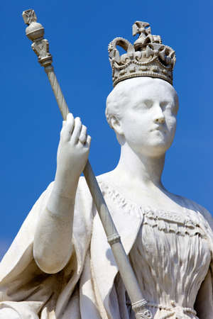 The impressive statue of Queen Victoria situated outside Kensington Palace in London.の写真素材