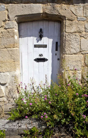 A quaint doorway in a rural British village のeditorial素材