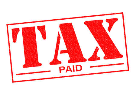 TAX PAID red Rubber Stamp over a white background.の写真素材