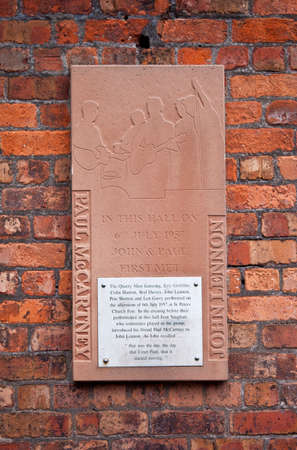 A plaque on St  Peters Church Hall Marking the First Meeting Place of Lennon and McCartneyのeditorial素材