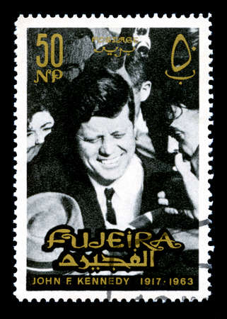 FUJEIRA, CIRCA 1965: A vintage Postage Stamp from Fujeira featuring an image of former President of the United States John F. Kennedy, circa 1965.のeditorial素材
