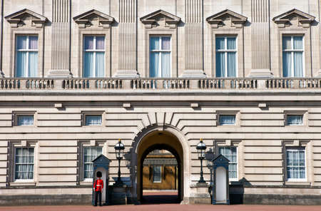 LONDON, UK - MAY 16TH 2014: A Queen's Guard outside the historic Buckingham Palace in London on 16th May 2014.のeditorial素材