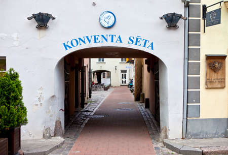 The archway leading the Covent Yard in Riga, Latvia のeditorial素材