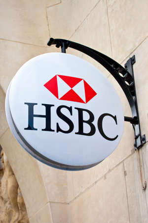 PARIS, FRANCE - AUGUST 4TH 2014: The sign for the 'HSBC' bank on Avenue des Champs-Elysees in Paris...