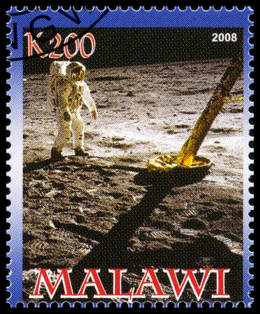 MALAWI - CIRCA 2008: A used postage stamp from Malawi commemorating the Apollo 11 Moon Landing, circa 2008.のeditorial素材