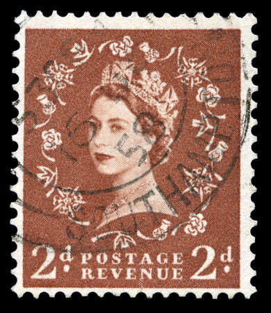 UNITED KINGDOM, CIRCA 1950s: A vintage British postage stamp depicting a portrait of Queen Elizabeth...