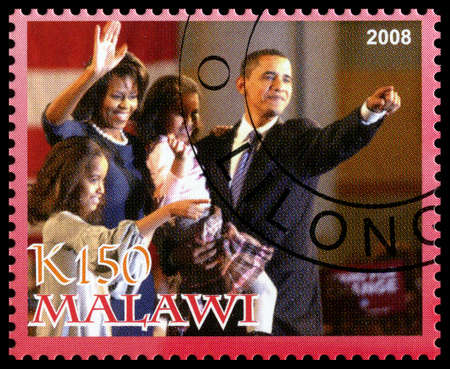 MALAWI - CIRCA 2008: A used Postage Stamp from Malawi depicting an image of Barack Obama (the 44th president of the United States of America) with his family, circa 2008.のeditorial素材