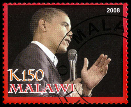 MALAWI - CIRCA 2008: A used Postage Stamp from Malawi depicting a portrait of Barack Obama, the 44th president of the United States of America, circa 2008.のeditorial素材