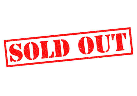 SOLD OUT red Rubber Stamp over a white background.の写真素材