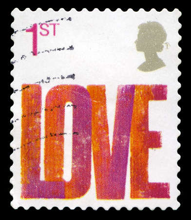 UNITED KINGDOM - CIRCA 2006: A used British postage depicting the word LOVE, circa 2006.のeditorial素材