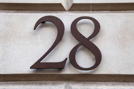 The Number 28 on a wall.の写真素材
