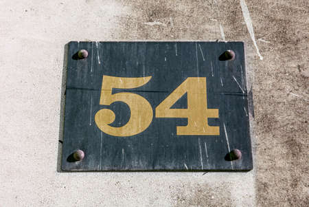 The Number 54 on a wall.の写真素材