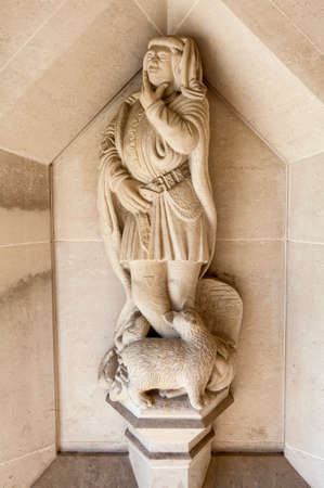 A sculpture of famous Englishman Richard (Dick) Whittington and his cat situated outside Guildhall Art Gallery in London.のeditorial素材