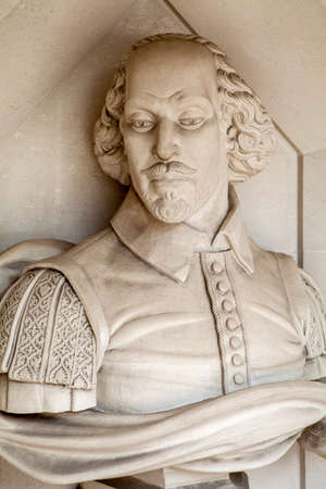 A sculpture of famous playwright William Shakespeare situated outside Guildhall Art Gallery in London.のeditorial素材