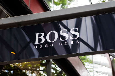 LONDON, UK - JUNE 10TH 2015: A sign on the shopfront of a Hugo Boss retail outlet in central London, on 10th June 2015.のeditorial素材