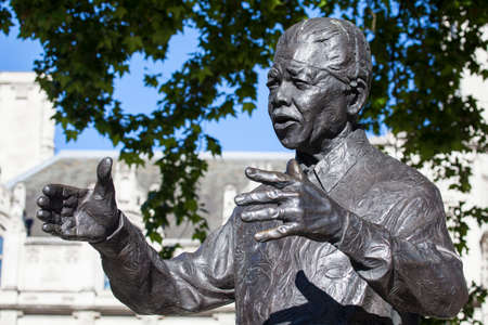 Staue of historic South African leader Nelson Mandela in Parliament Square, London.のeditorial素材