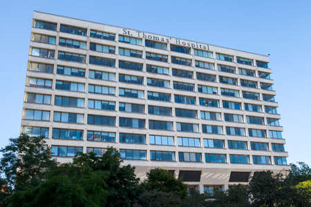 LONDON, UK - JUNE 30TH 2015: A view of the historic St. Thomasâ Hospital in London, on 30th June 2015.のeditorial素材