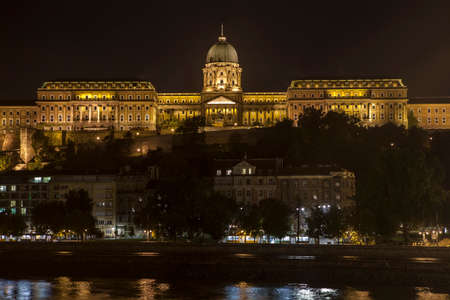 The beautiful Buda Castle and the River Danube at night in Budapest, Hungary.のeditorial素材