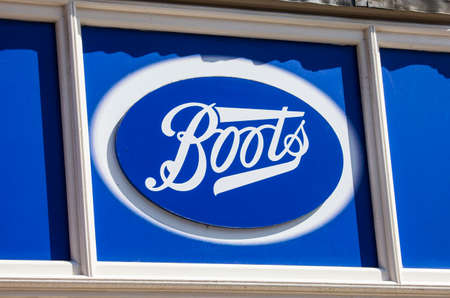 YORK, UK - AUGUST 26TH 2015: A sign for a Boots retail outlet in York, on 26th August 2015.のeditorial素材