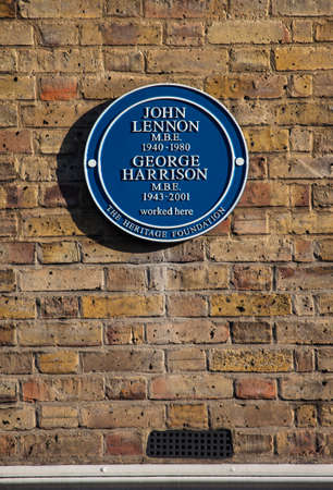 LONDON, UK - JANUARY 19TH 2016: A blue plaque marking the former location of The Beatlesâ defunct Apple Boutique shop on Baker Street in London, on 19th January 2016.のeditorial素材