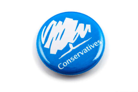 LONDON, UK - MARCH 3RD 2016: A Conservatives (Conservative Party) pin badge over a white background, on 3rd March 2016.のeditorial素材