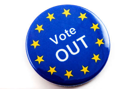 LONDON, UK - MARCH 3RD 2016: A VOTE OUT pin badge over a white background, on 3rd March 2016.  The badge refers to the upcoming referendum regarding UKâs membership in the European Union.のeditorial素材