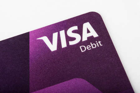LONDON, UK - JUNE 13TH 2016: A close-up shot of the Visa logo on a debit card, taken in London on 13th June 2016.のeditorial素材