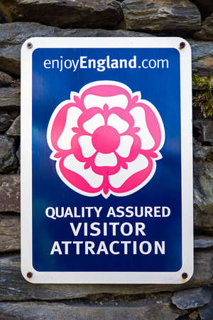 CUMBRIA, UK - MAY 29TH 2016: An Enjoy England recommended and Quality Assurance sign at a visitor attraction in the Lake District National Park, on 29th May 2016.のeditorial素材