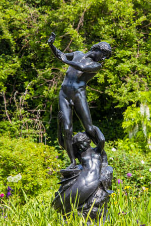 LONDON, UK - JUNE 6TH 2016: Hylas and the Nymph statue located in the beautiful St. Johns Lodge Gardens in Regents Park, London 6th June 2016.のeditorial素材
